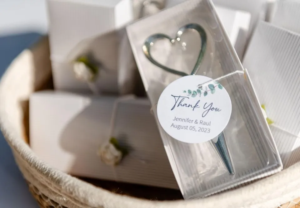 Heart bottle opener wedding favors with thank you tags