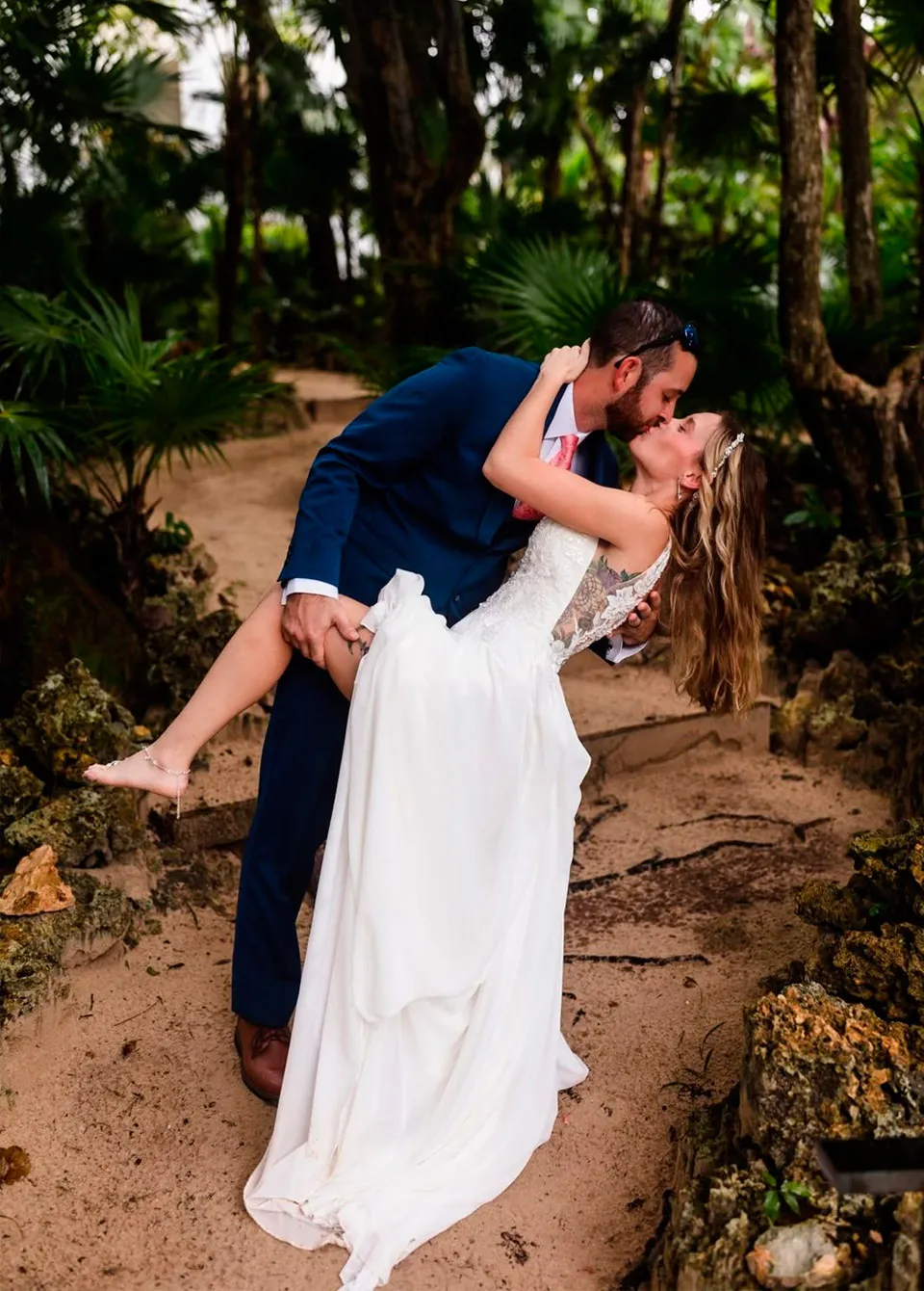 Michael dipping Audrey in the tropical garden at Kimpton Grand Roatán