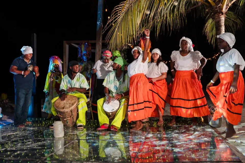 Garifuna dancers performing at a wedding reception in Roatán